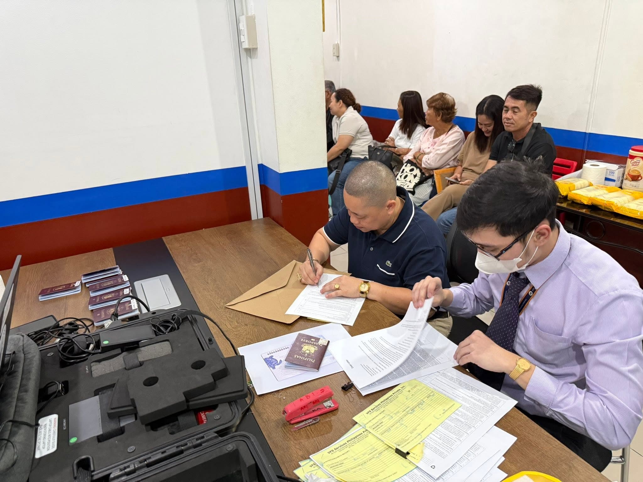 Tripventures team assisting travelers with their documents